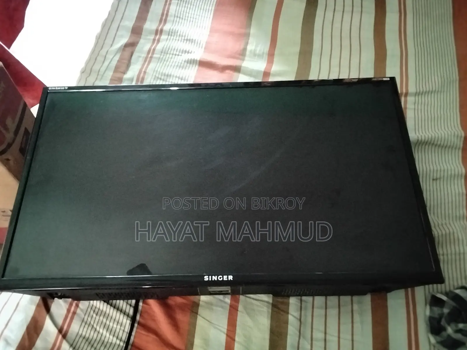 Brand new condition Singer LED TV and a setup box used for one month