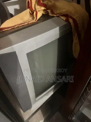 CRT TV for sale for the Football World Cup, comes with a table