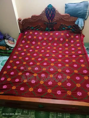 Red-Maroon Nakshi Kantha with exquisite handwork and a touch of tradition