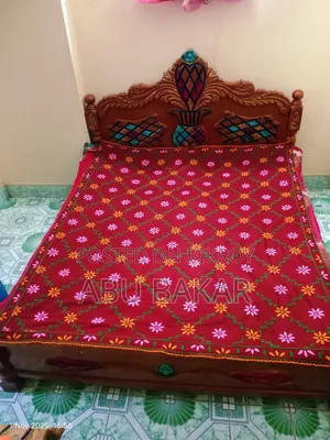 Red-Maroon Nakshi Kantha with exquisite handwork and a touch of tradition