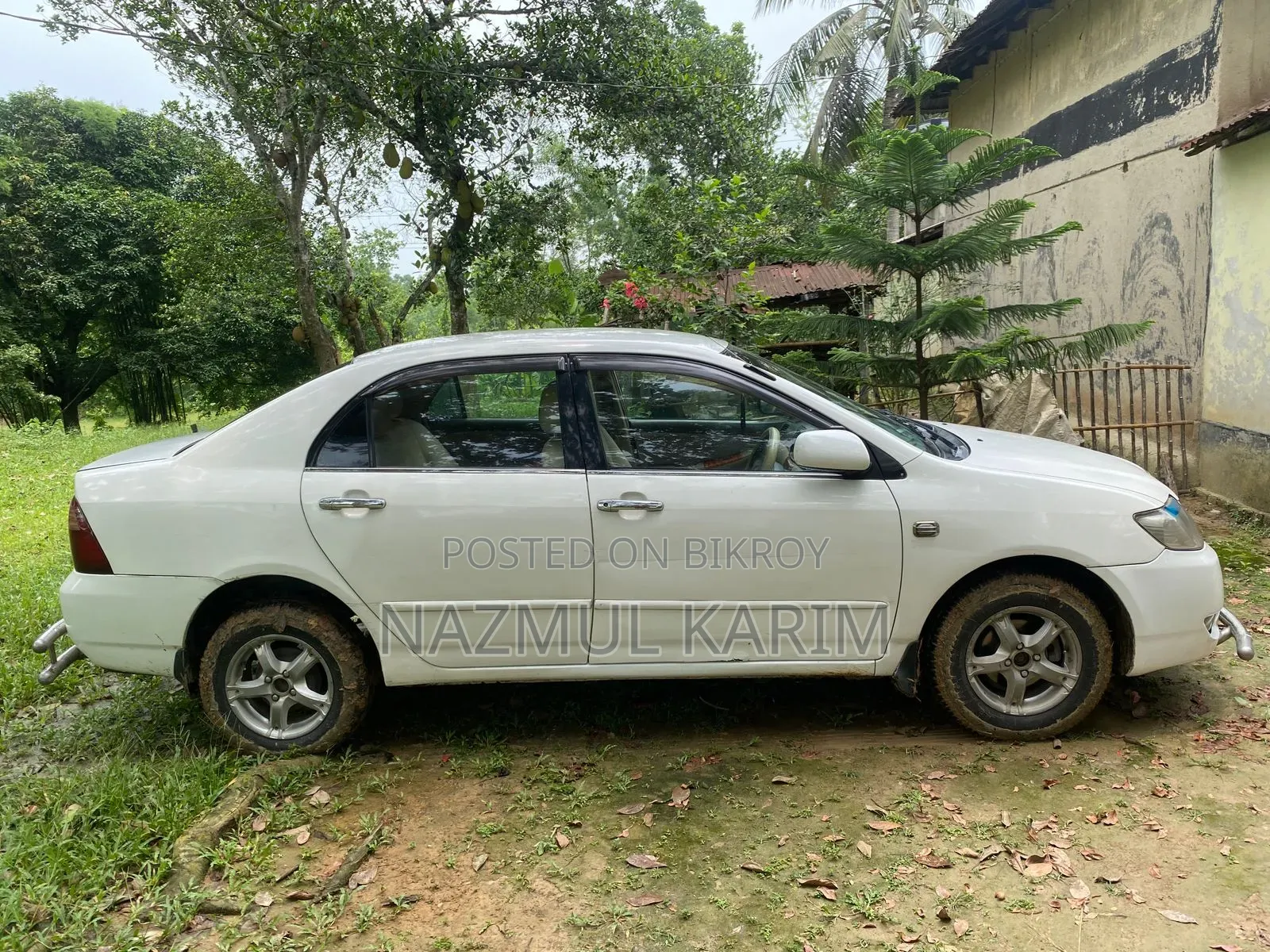 টয়োটা করোলা সেডান ২০০৫ সাদা