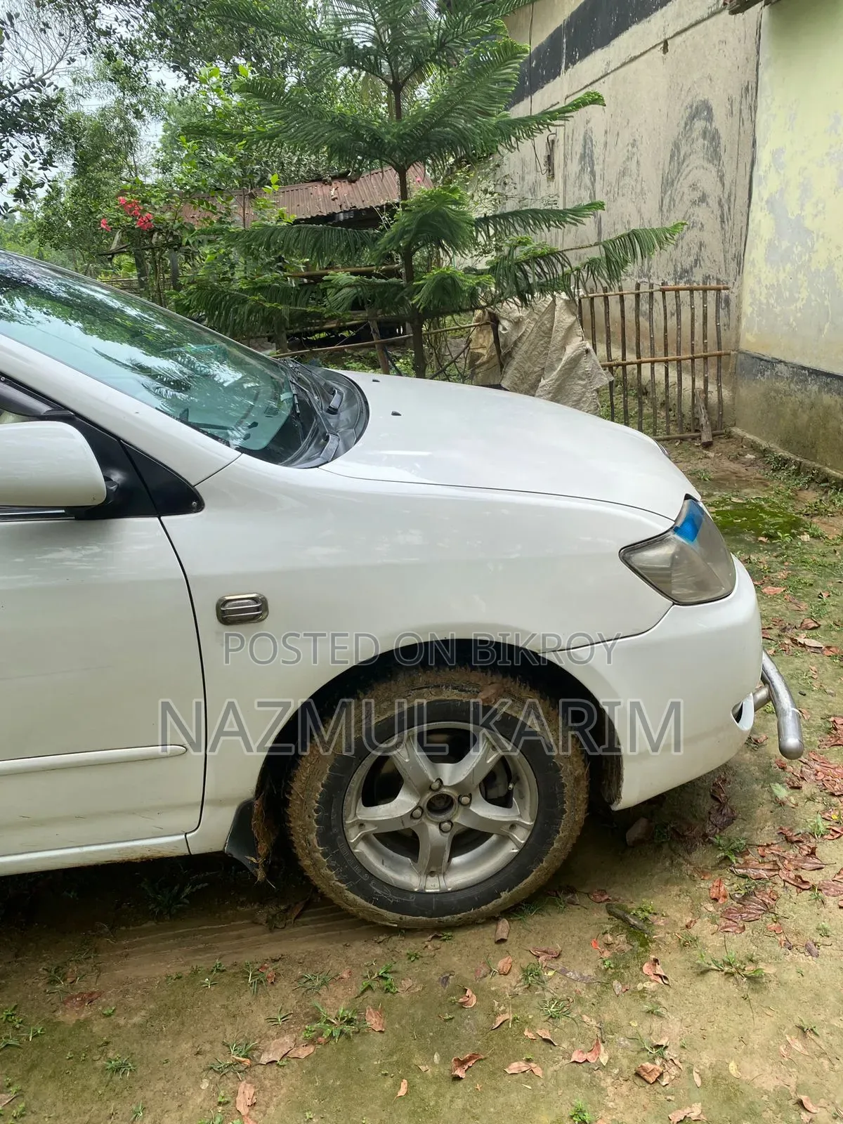 টয়োটা করোলা সেডান ২০০৫ সাদা