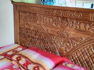 Brand new teak wood bed for sale.