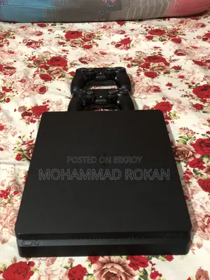 Sony Playstation 4 With Two Controllers