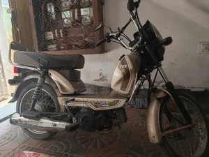TVS XL 100 2025 Brown