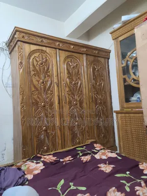 Three-part teak wood wardrobe