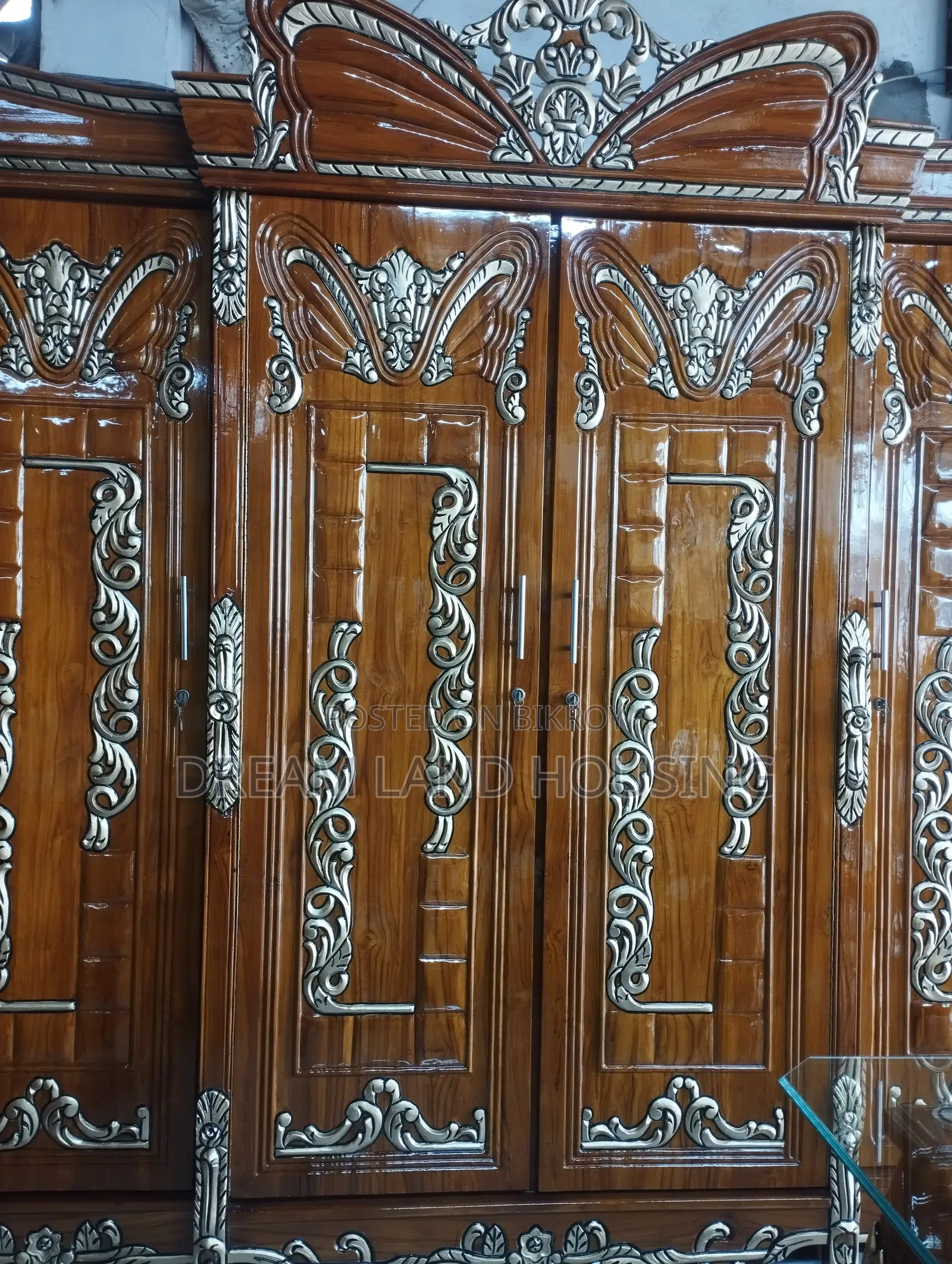 Get a royal Padma design 4-door Chittagong teak wood wardrobe
