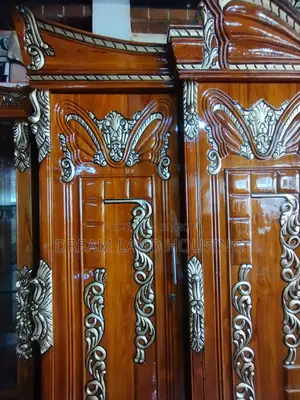 Get a royal Padma design 4-door Chittagong teak wood wardrobe