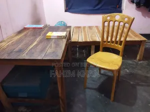 Large table, chair, large bed/cot