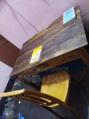 Large table, chair, large bed/cot
