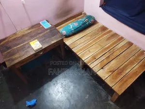 Large table, chair, large bed/cot