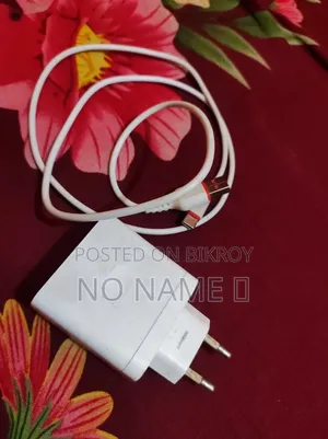 Oppo ফোনের অরিজিনাল চার্জার । কেবল শুধু মার্কেট থেকে কেনা হয়েছিল।