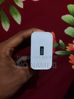 Oppo ফোনের অরিজিনাল চার্জার । কেবল শুধু মার্কেট থেকে কেনা হয়েছিল।