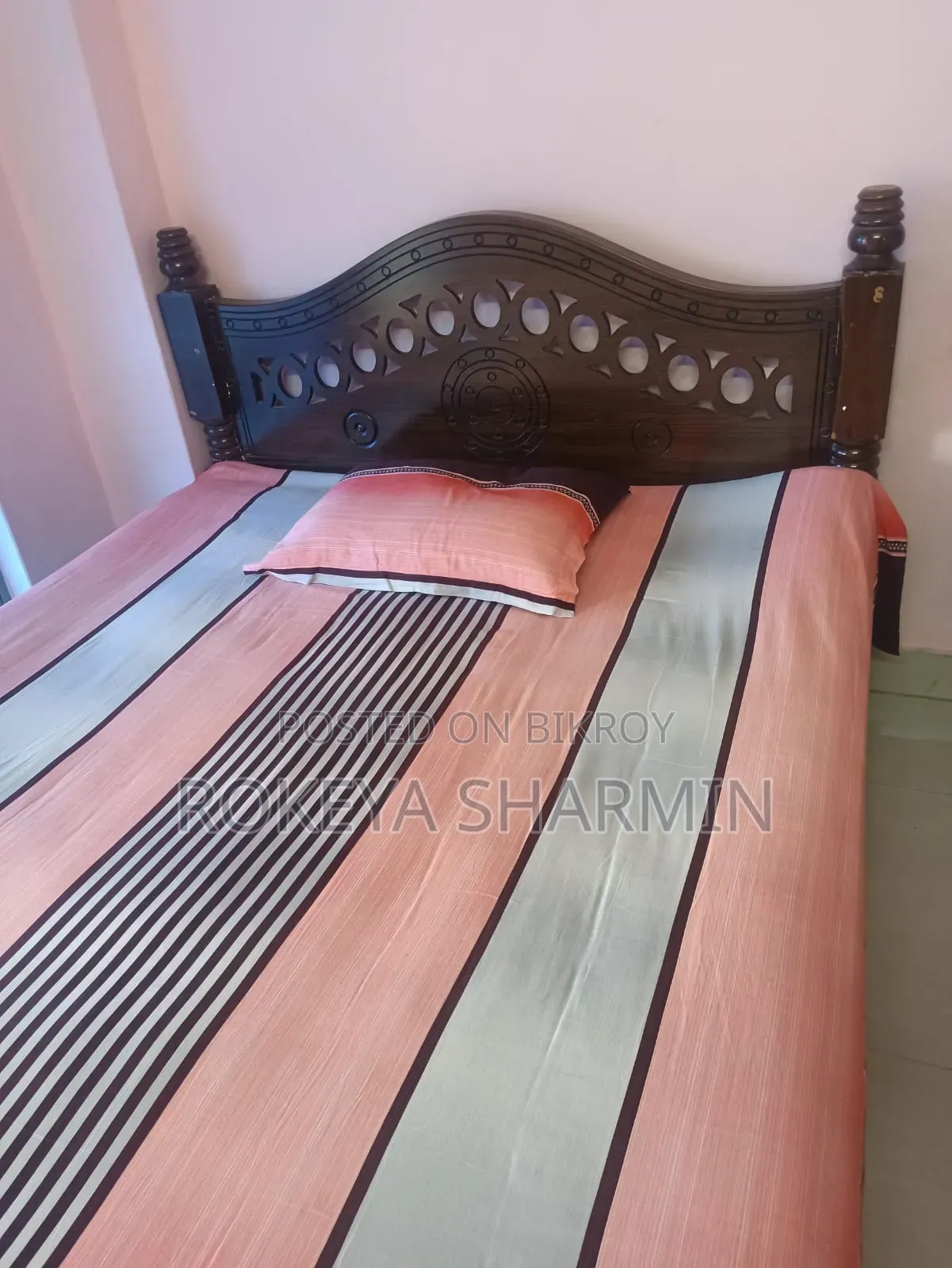 5-inch by 7-inch used wooden bed