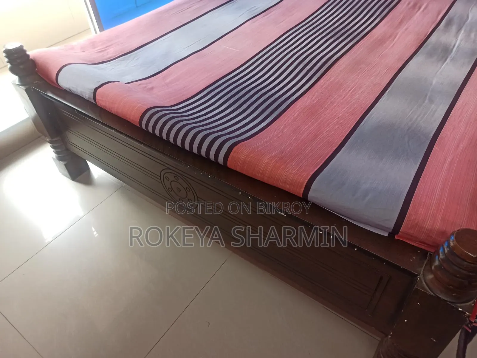 5-inch by 7-inch used wooden bed