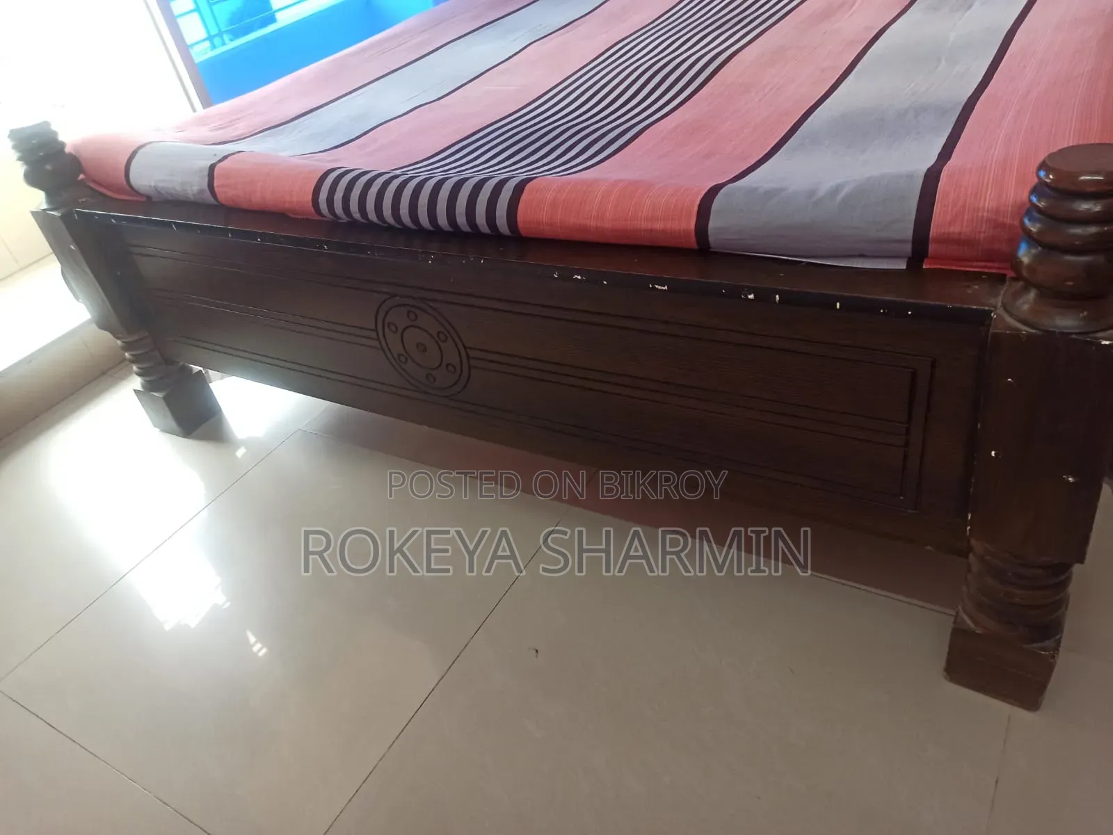 5-inch by 7-inch used wooden bed