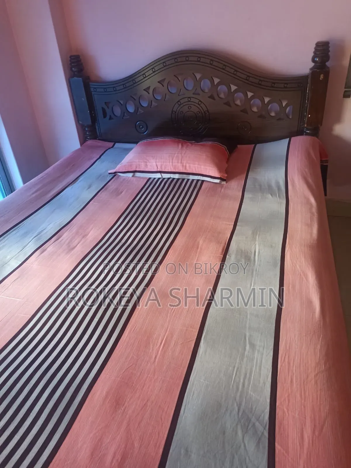 5-inch by 7-inch used wooden bed
