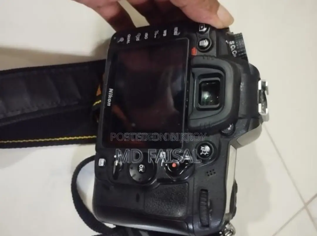 Nikon D7000 DSLR Camera + 50mm Lens + Nikon 55-200mm + 16GB Memory Card