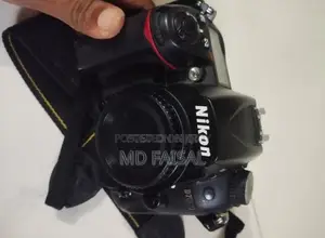 Nikon D7000 DSLR Camera + 50mm Lens + Nikon 55-200mm + 16GB Memory Card