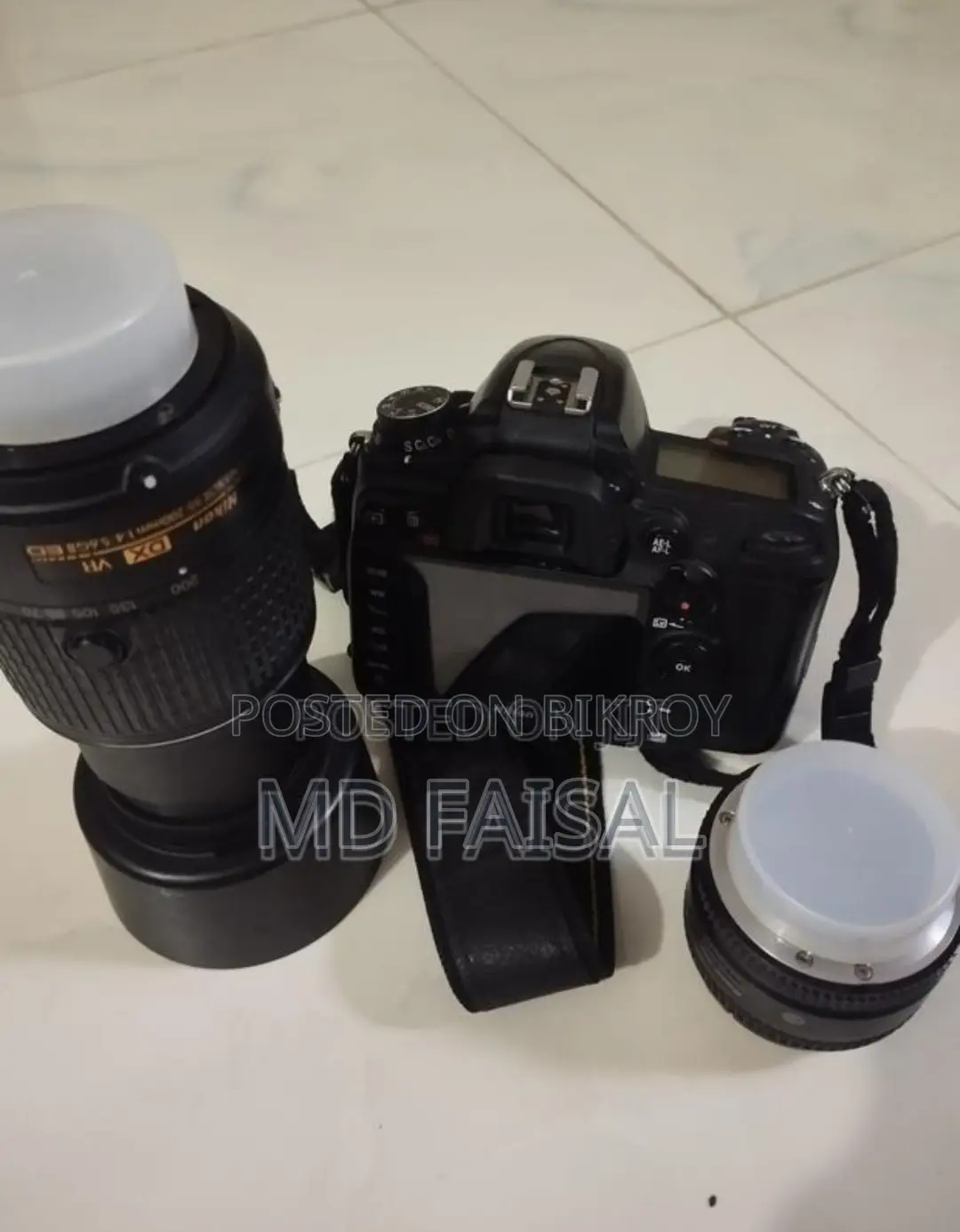 Nikon D7000 DSLR Camera + 50mm Lens + Nikon 55-200mm + 16GB Memory Card