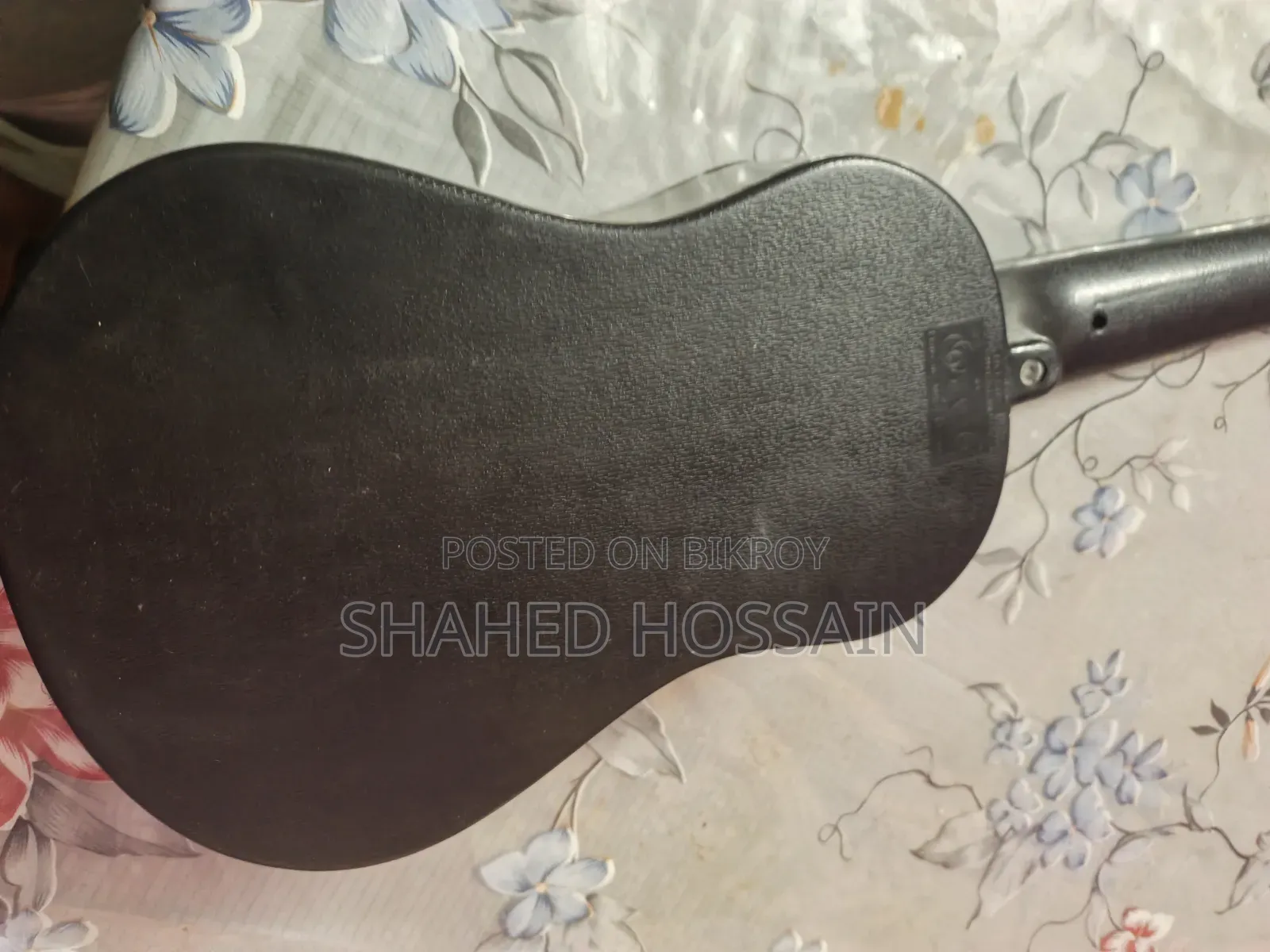 Guitar used for one week, two strings missing, includes two extra strings for 50