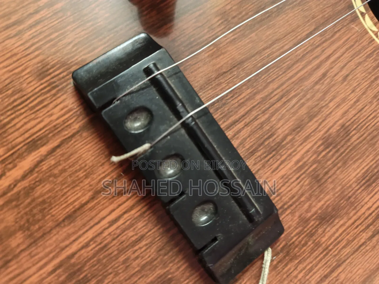Guitar used for one week, two strings missing, includes two extra strings for 50
