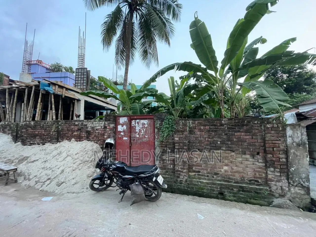 Corner plot for sale in Bogura Shibbati with approved 5-story plan.