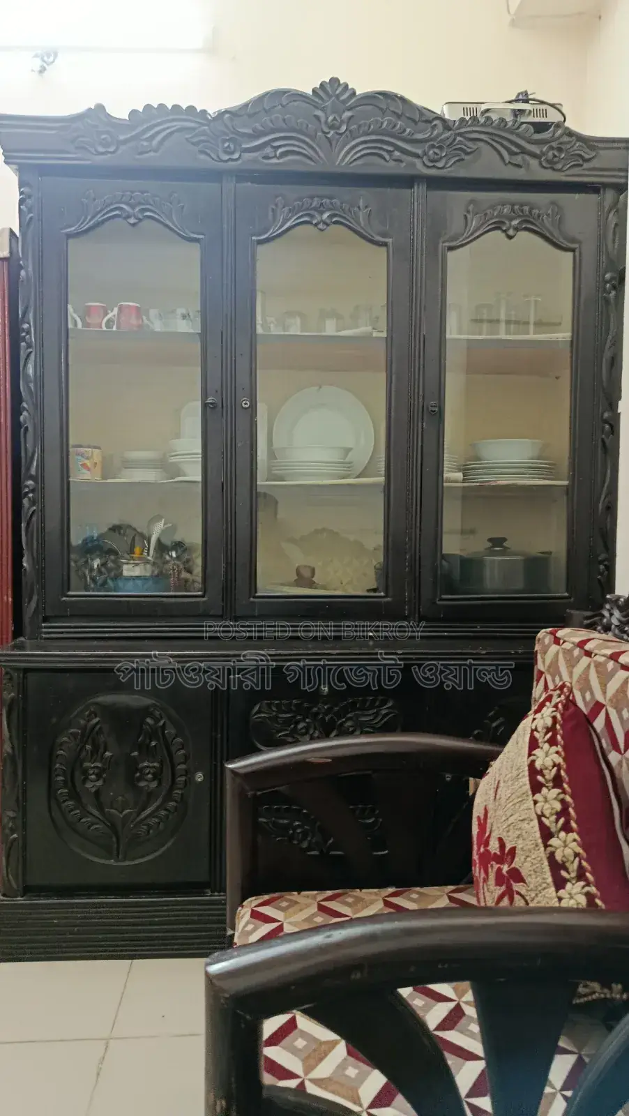 A wooden showcase for sale.