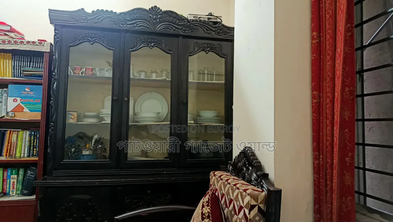 A wooden showcase for sale.