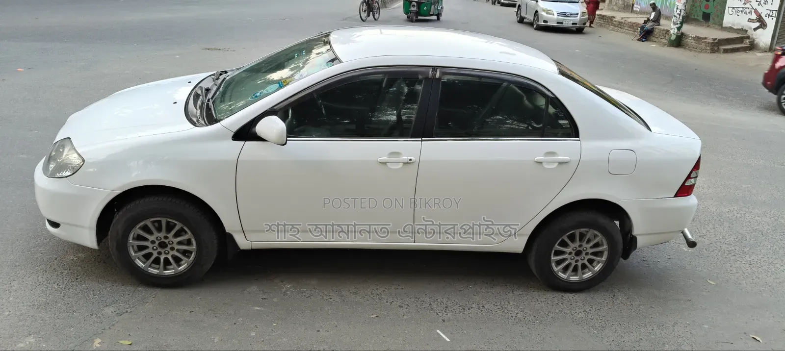 টয়োটা করোলা ২০০৪ সাদা