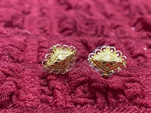 21 Karat Gold