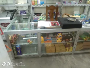 Some Aluminum Glass Racks and a Glass Counter Display
