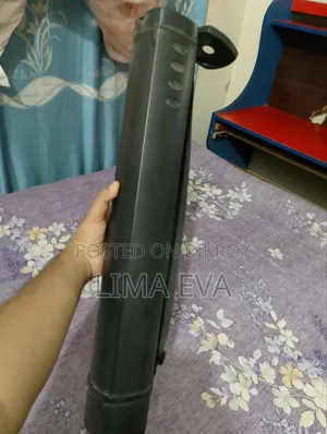 Black poster tube, approximately 24 to 40 inches in length