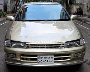 টয়োটা কারিনা ১.৫ ফ্রন্ট হুইল ড্রাইভ সেডান ১৯৯৩ গোল্ড