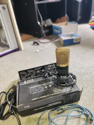 Full fresh condition, like new. E22 Sound Card Xtuga Microphone
