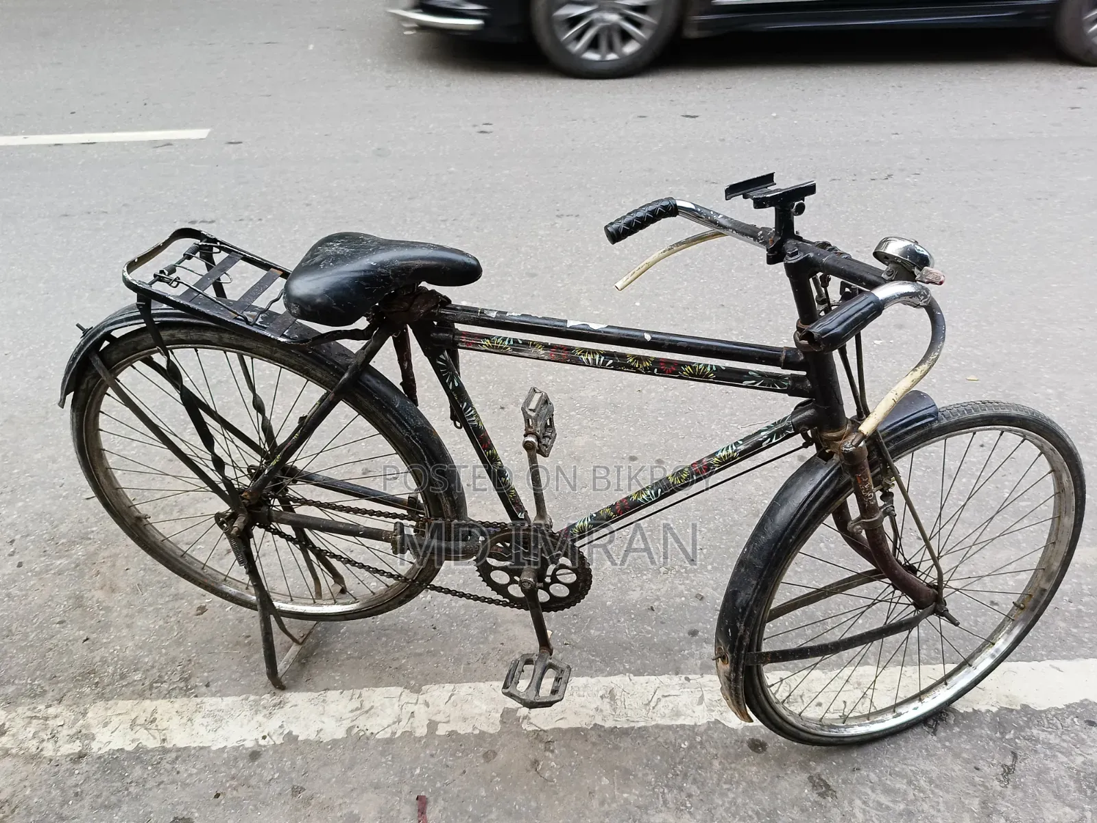 Running bicycle, rear wheel is wobbling, no other problems, number below