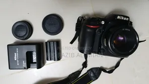 Nikon D7100 + 50mm Lens + 18-300mm Telephoto Zoom Lens