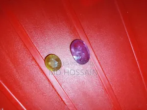 A high-quality Burma ruby stone and a yellow sapphire stone for sale
