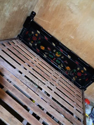 Excellent double bed made of mahogany wood for urgent sale (used for 2 years)