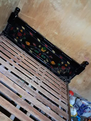 Excellent double bed made of mahogany wood for urgent sale (used for 2 years)