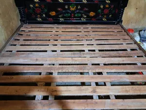 Excellent double bed made of mahogany wood for urgent sale (used for 2 years)