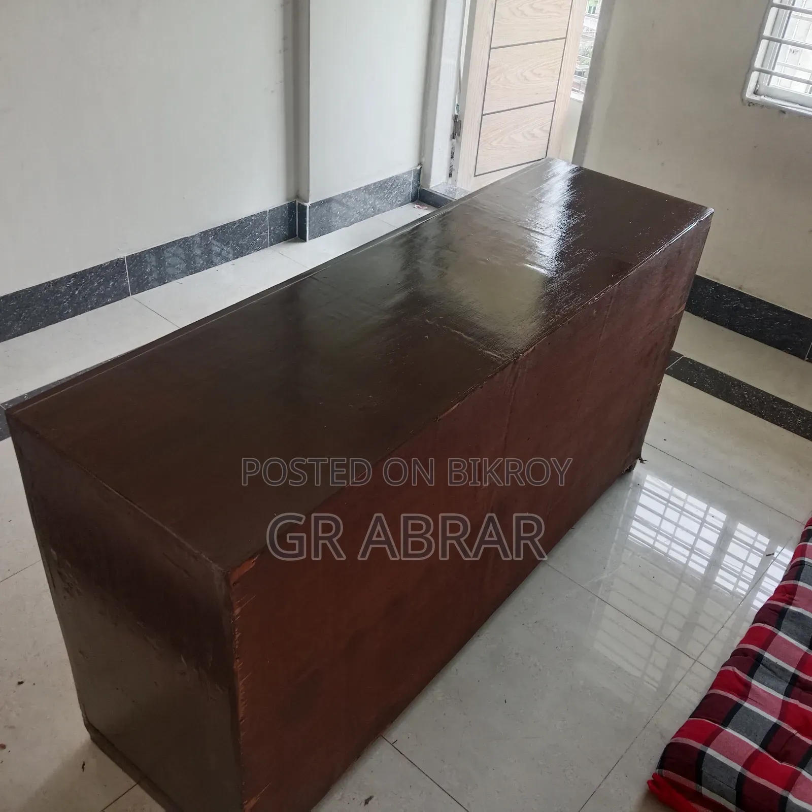 A wooden cabinet wardrobe for emergency sale.