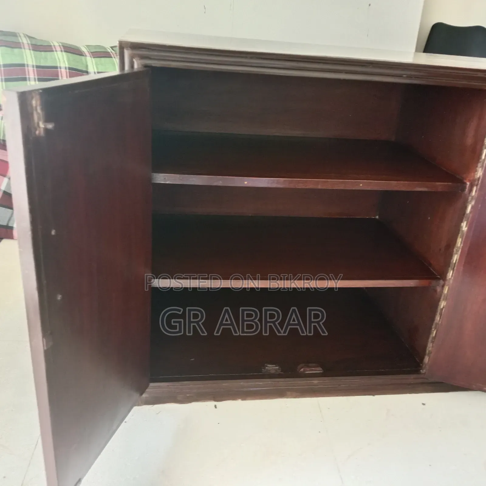 A wooden cabinet wardrobe for emergency sale.