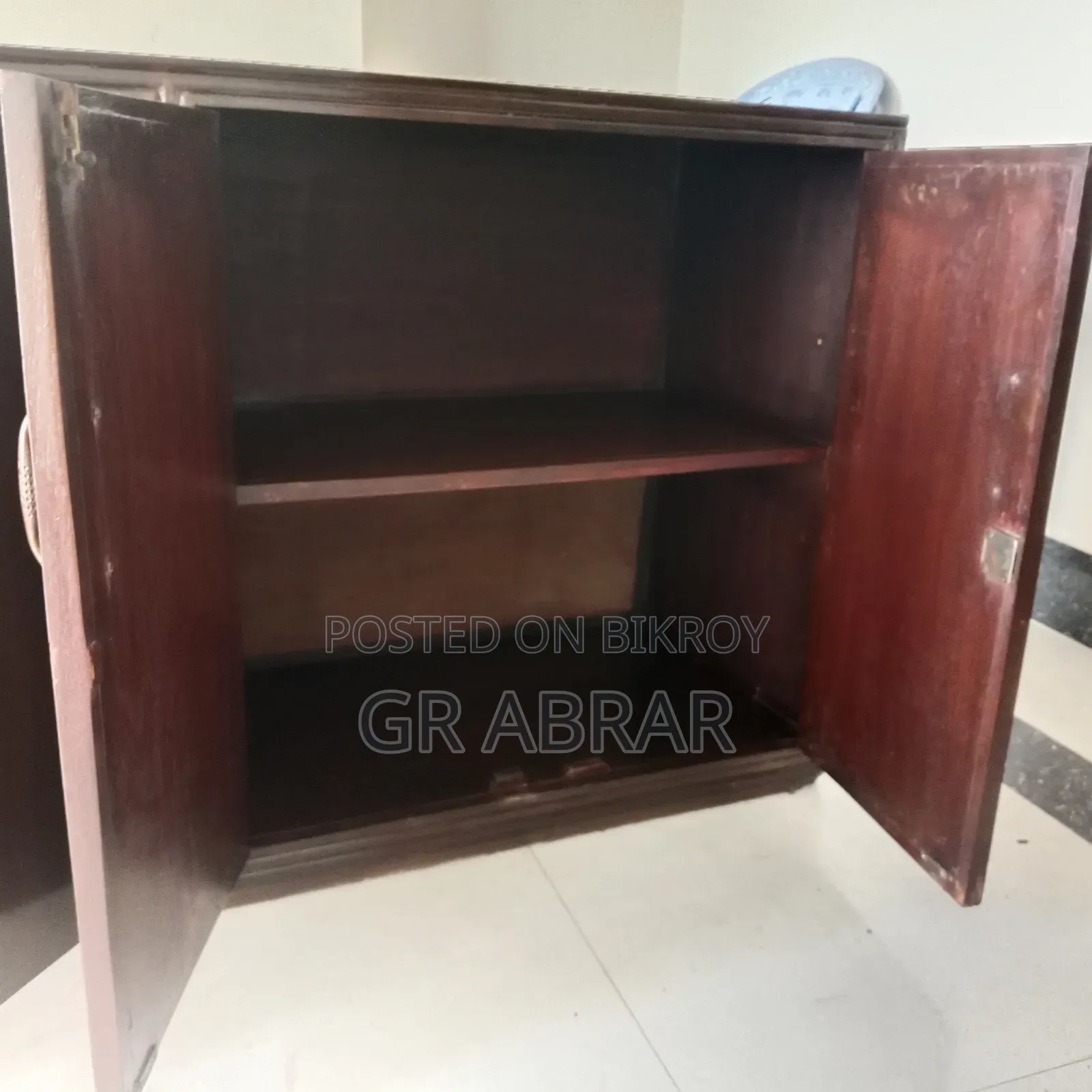 A wooden cabinet wardrobe for emergency sale.