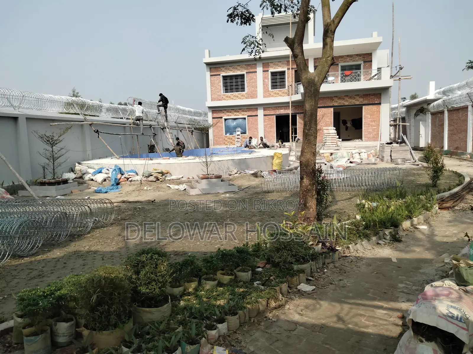 অপেক্ষা না করে বাউন্ডারি করা প্লট কিনেই বাড়ি করুন