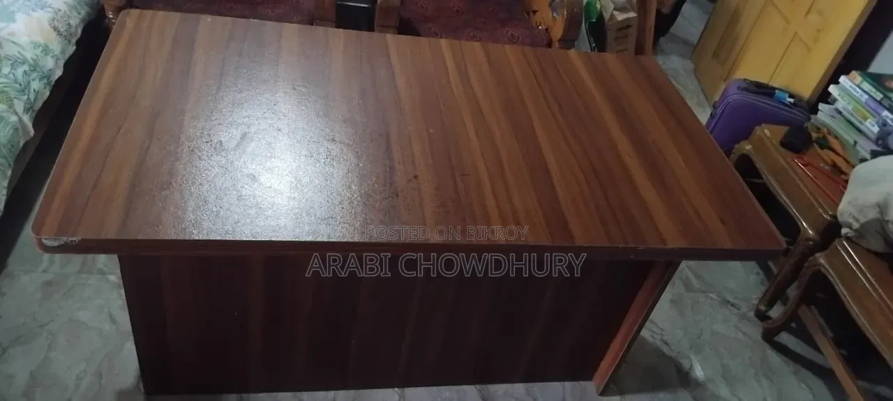 A study table for sale, can hold TV and computer