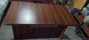 A study table for sale, can hold TV and computer