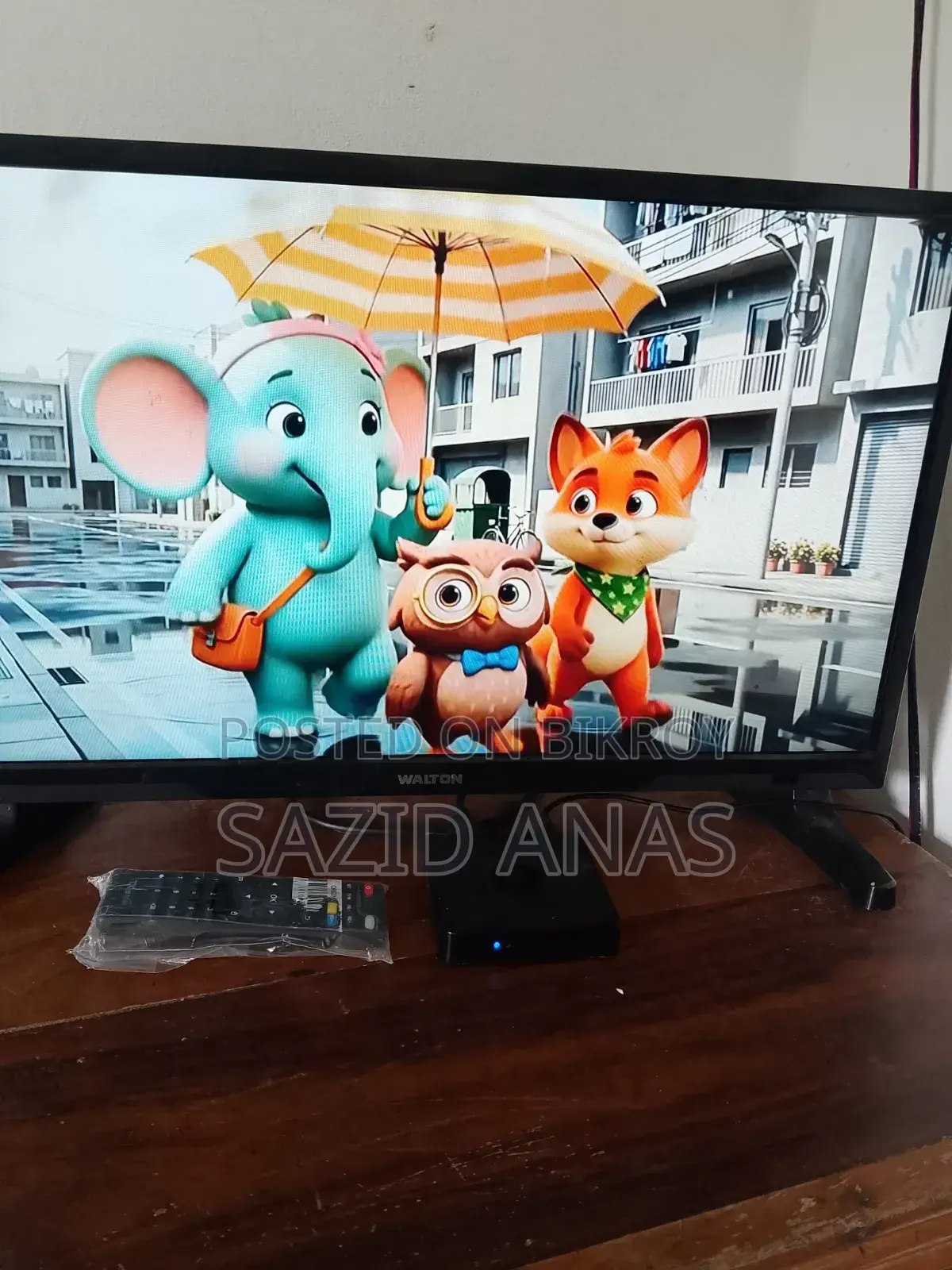 24-inch LED TV, with Smart TV box.