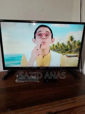 24-inch LED TV, with Smart TV box.
