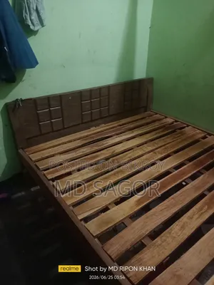 A bed and mattress for sale